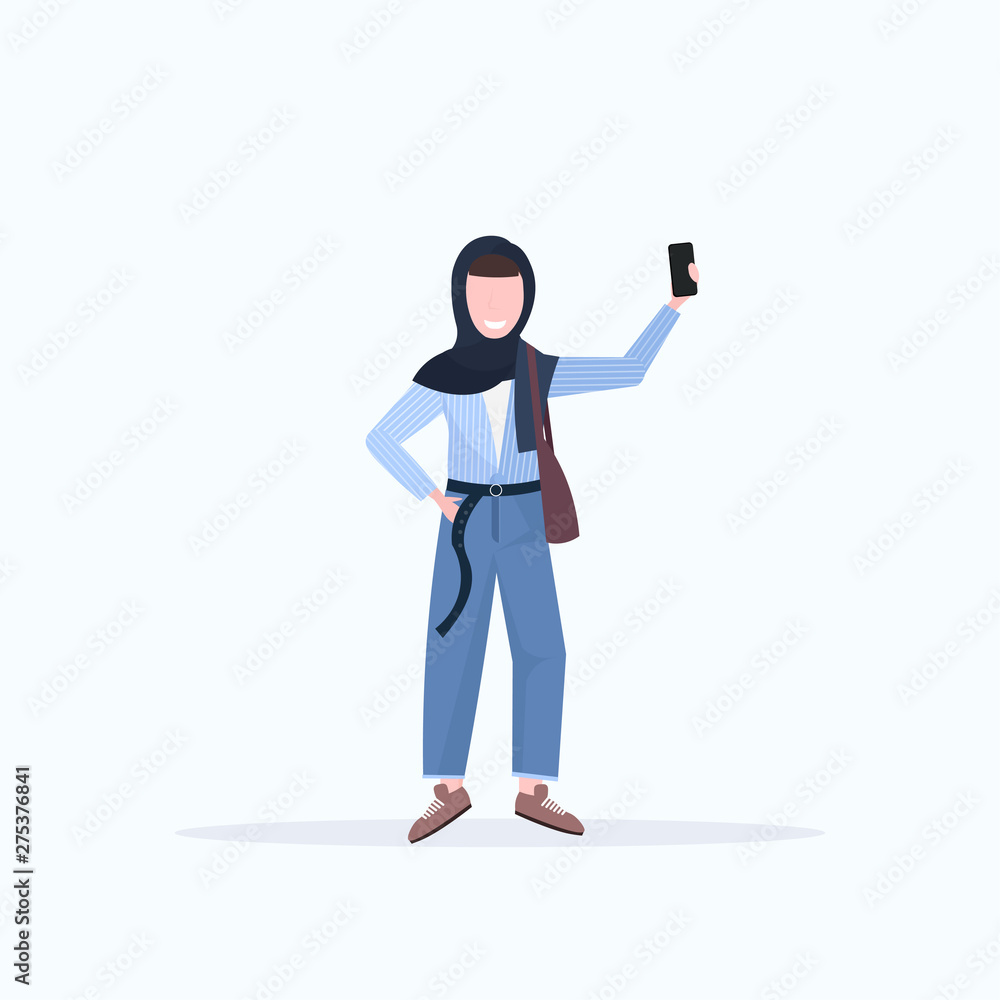 woman in headscarf taking selfie photo on smartphone camera arab female cartoon character with handbag posing white background flat full length woman in headscarf taking selfie photo on smartphone camera arab female cartoon character with handbag posing white background flat full length