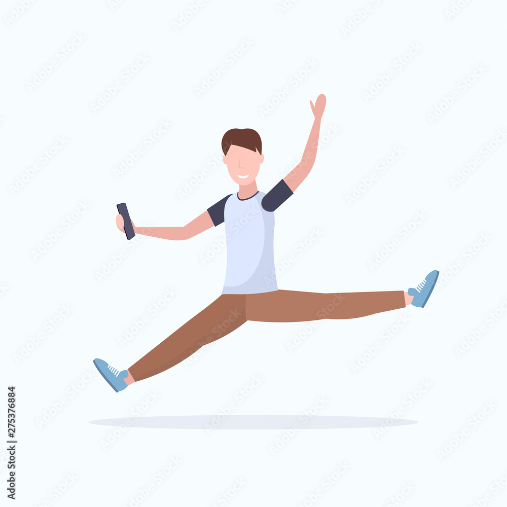 Fototapeta premium man taking selfie photo on smartphone camera casual male cartoon character jumping posing white background flat full length