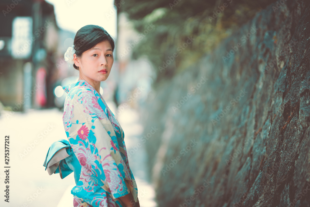 Woman dress up Japanese traditional Yukata on Kyoto street Woman dress up Japanese traditional Yukata on Kyoto street