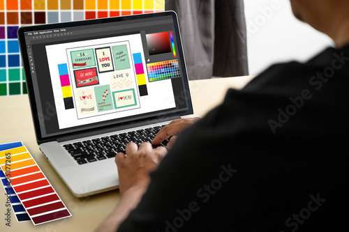 Creative Designer Graphic at work. , Illustrator Graphic designer working digital tablet and computer Color swatch samples