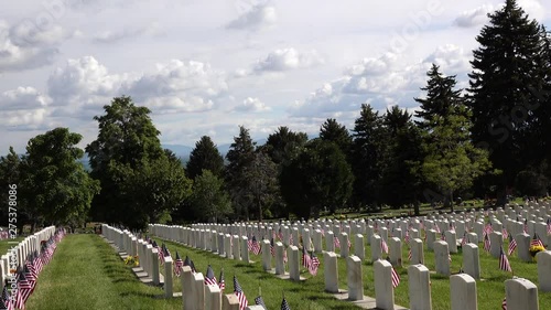 Tilt Down from Sky to Military Headstones