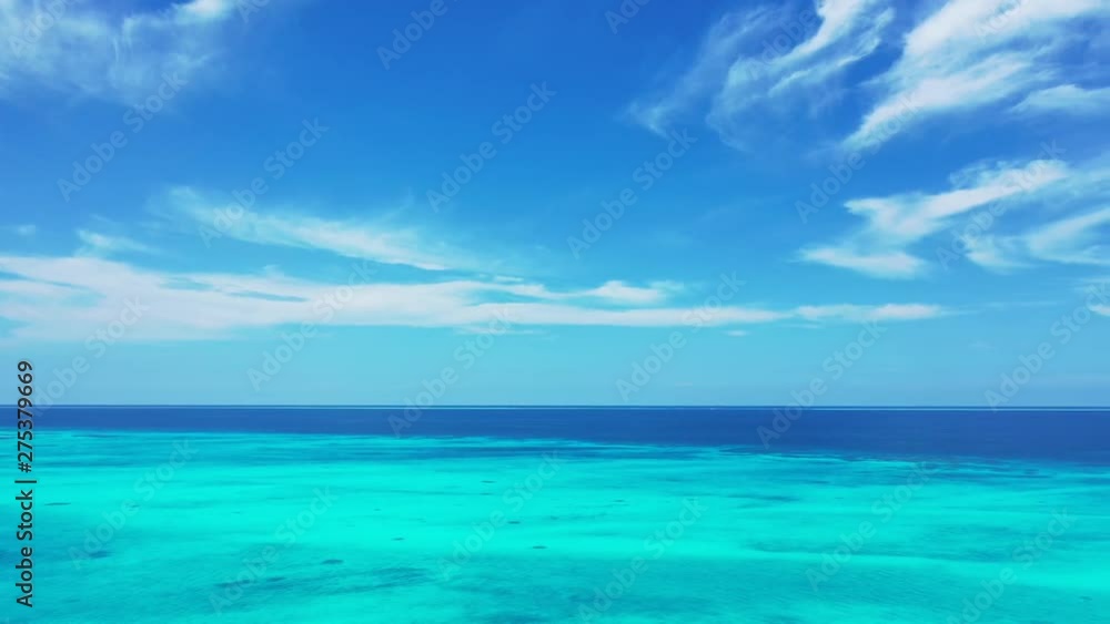 Panoramic view of endless azure waters in front of Barbados, with blue sky above Panoramic view of endless azure waters in front of Barbados, with blue sky above