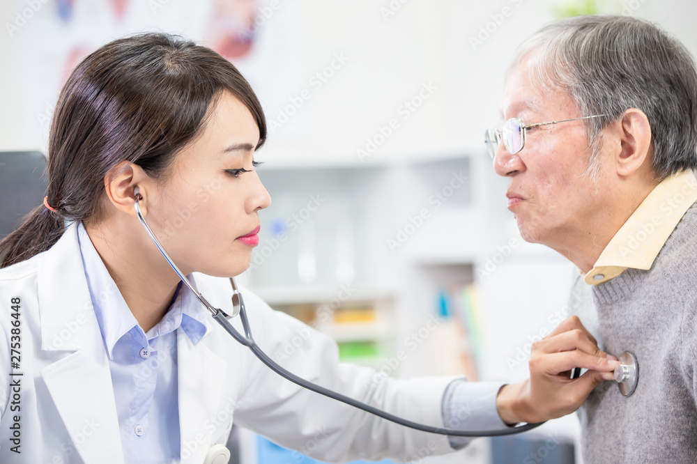 Female doctor do heartbeat check Female doctor do heartbeat check