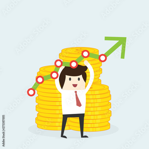 Happy success business man with a lot of money earnings and business graph