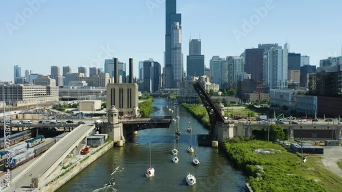 Zoom In as Boats Navigate the Chicago River during bi-weekly Bridge Raise