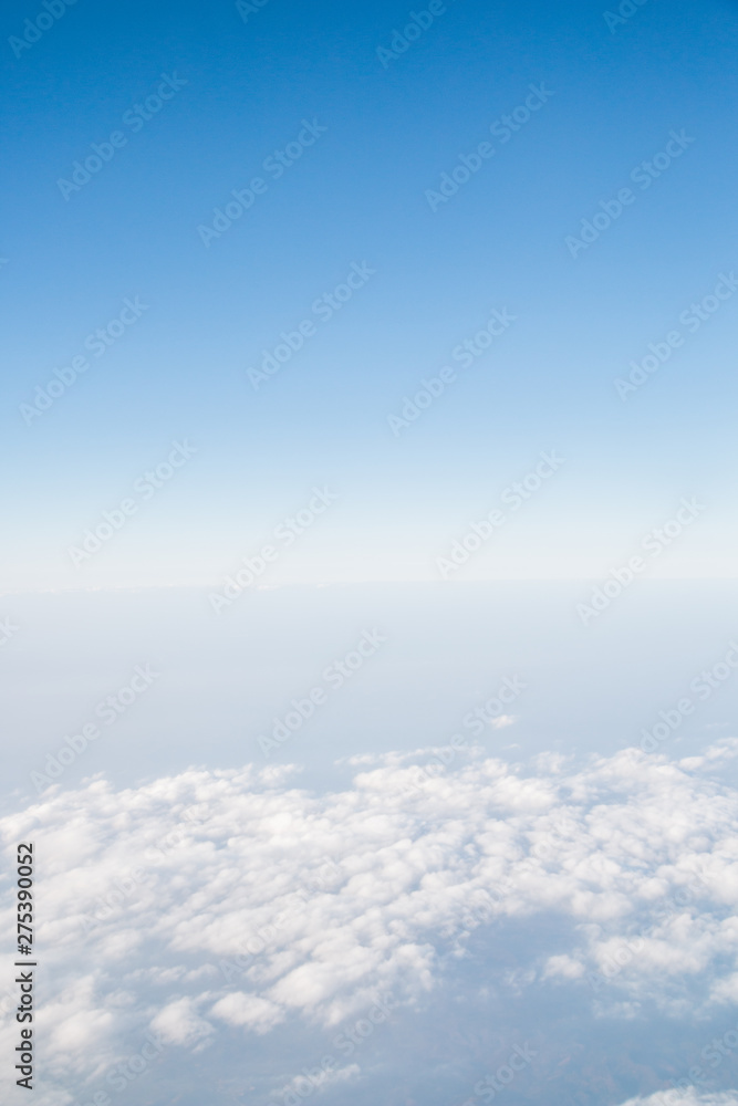 Blue sky with clouds background. View from airplane Blue sky with clouds background. View from airplane