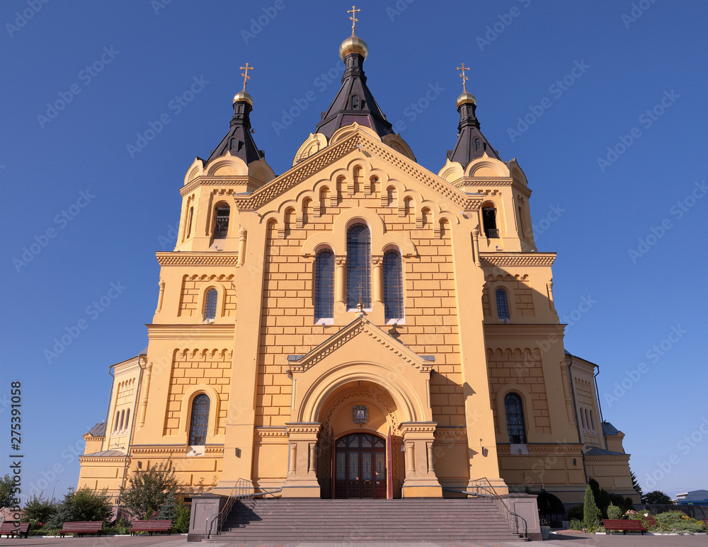 Alexander Nevsky Cathedral, Nizhny Novgorod, Russia. Frontal view at with three visible towers with domes and high windows