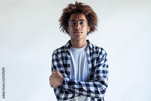 Tableau sur toile Handsome young african american man looking at camera over white background