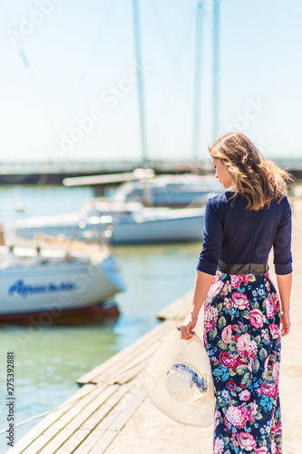 Beautiful girl in a dress on the beach, fashion woman, sea, sunny island © freshstockplace