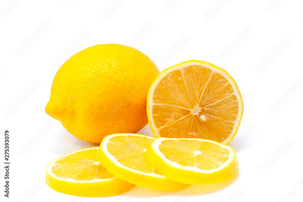 Whole and sliced pieces lemons isolated on white background. Whole and sliced pieces lemons isolated on white background.
