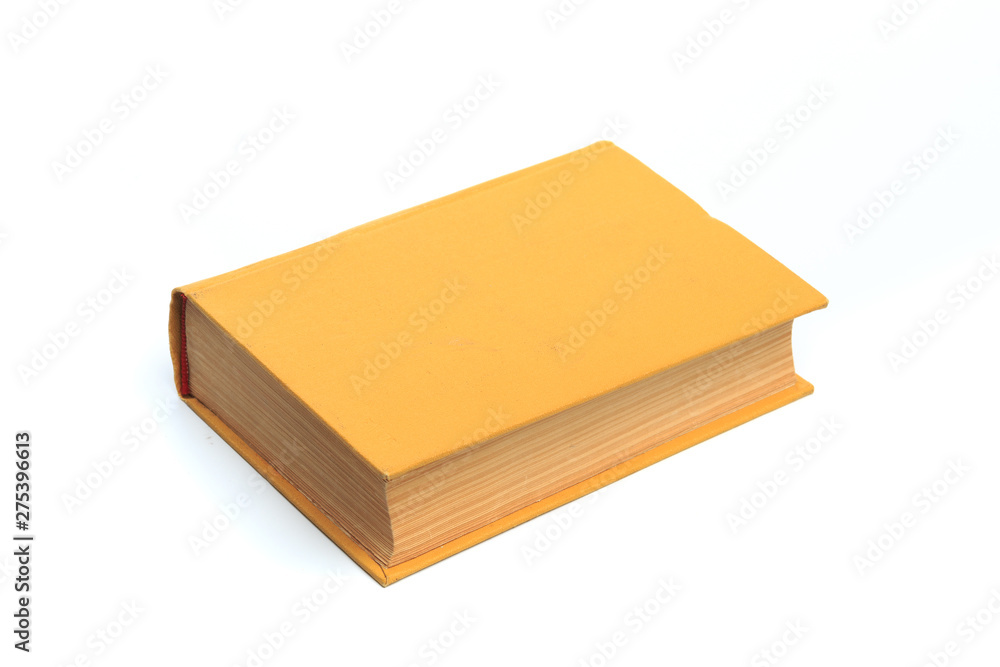 Closed yellow book isolated on a white background Closed yellow book isolated on a white background