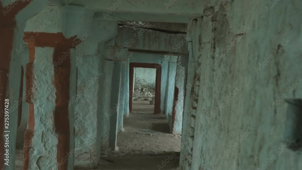 Passage towards an entrance of an old temple in Hampi, Karnataka Passage towards an entrance of an old temple in Hampi, Karnataka