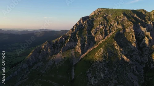 Aerial shot of famous mountain in a Hungarian village Torocko (Rimetea) from Transylvania, Romania photo