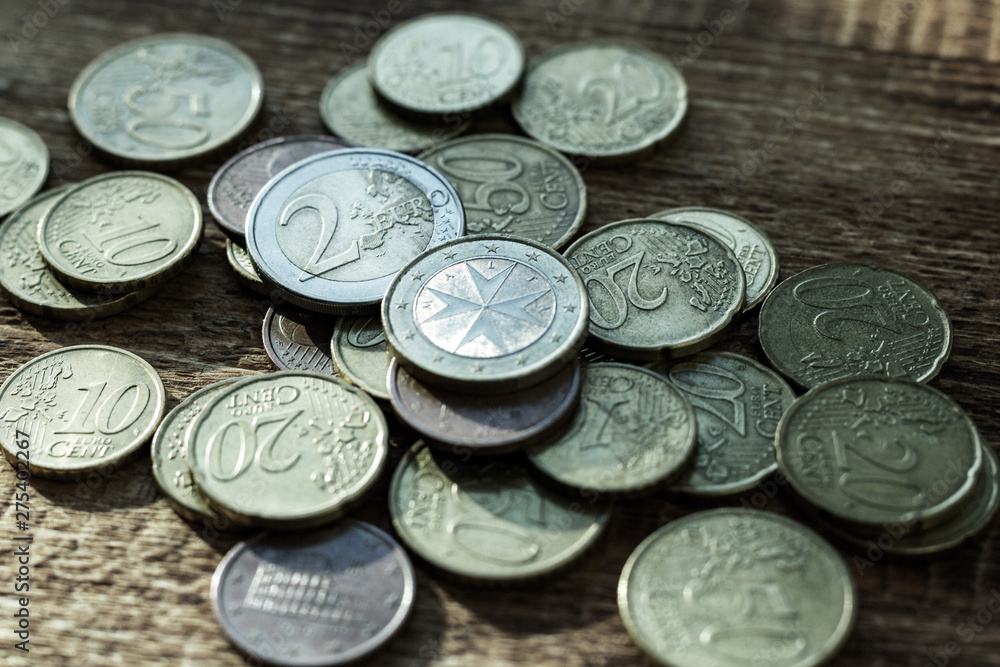 coins old rusty brass euro pile pack heap stack on a wooden background finance economy investment savings concept mock up selective focus close up coins old rusty brass euro pile pack heap stack on a wooden background finance economy investment savings concept mock up selective focus close up