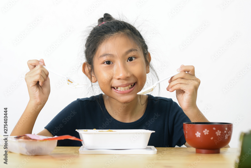 Asian girl eating spaghetti food box from convenient store, modern lifestyle concept. Asian girl eating spaghetti food box from convenient store, modern lifestyle concept.