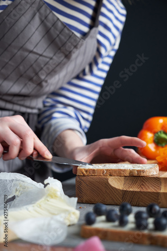 Woman making healthy sandwiches