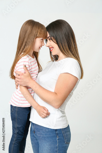 Portrait of happy mother an...