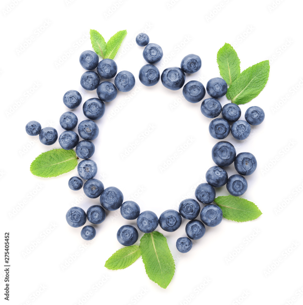 Fototapeta premium Frame made of fresh ripe blueberry on white background