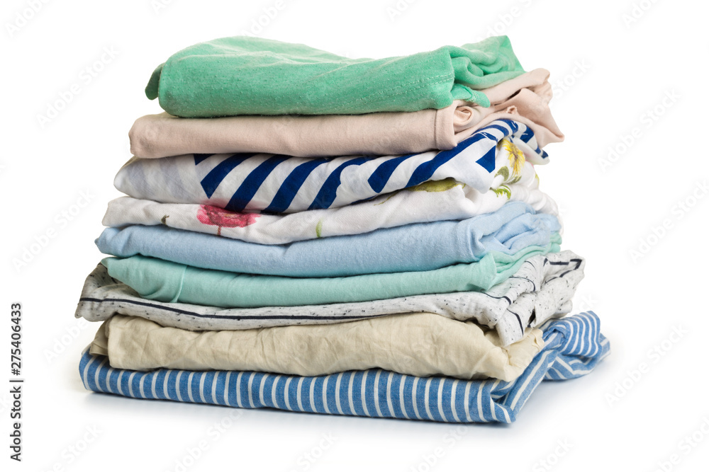 Pile of colorful clothes, isolated white background Pile of colorful clothes, isolated white background