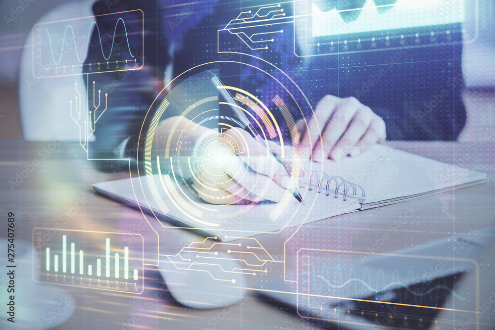 Double exposure of writing hands on background with data solution hologram on front. Technology concept. Close up Double exposure of writing hands on background with data solution hologram on front. Technology concept. Close up