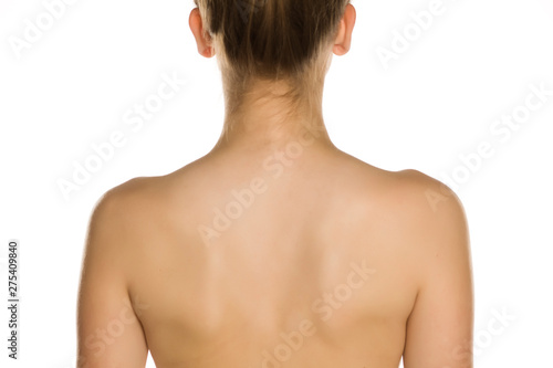Nude back of young women on white background