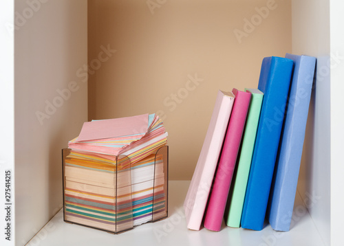 books on a wooden shelf at home or office