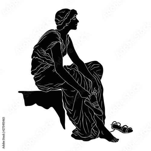 An ancient Greek young woman sits and takes off her sandals. Vector image isolated on white background.