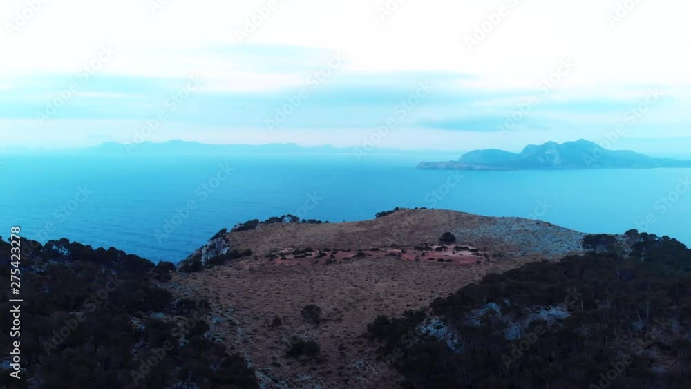 Aerial view of cool morning sunrise on dry rocky sand cliff ocean background. Mallorca Majorca Spain Aerial view of cool morning sunrise on dry rocky sand cliff ocean background. Mallorca Majorca Spain
