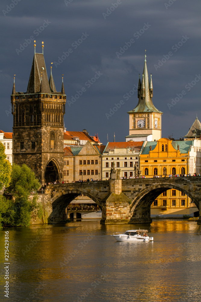 Scenic view on Charles Bridge  Vltava river and historical center of Prague. Summer day. Czech Republic.  Travel, sightseeing and tourism.