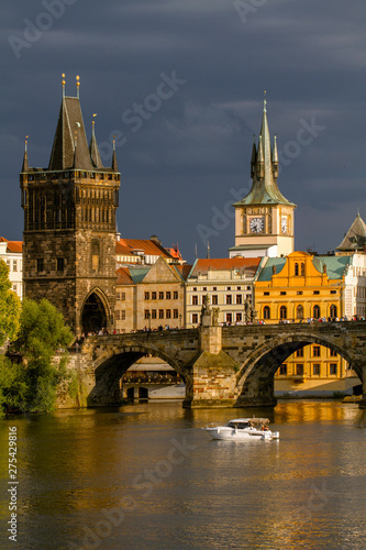 Scenic view on Charles Bridge Vltava river and historical center of Prague. Summer day. Czech Republic. Travel, sightseeing and tourism.