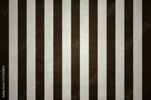 Grunge background made with vertical black and white stripes overlaid with grungy elements