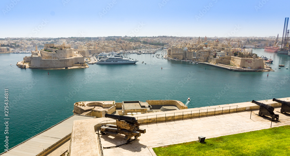 Panorama of the Grand Harbor, also known as the Port of Valletta, Malta from Upper Barrakka Garden battery