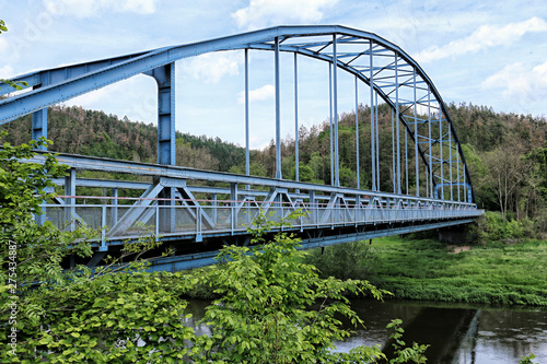Blue metal bridge over the Berounka river