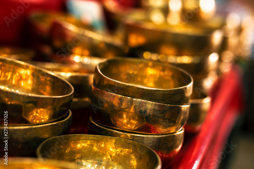 Traditional singing bowls in Indian shop
