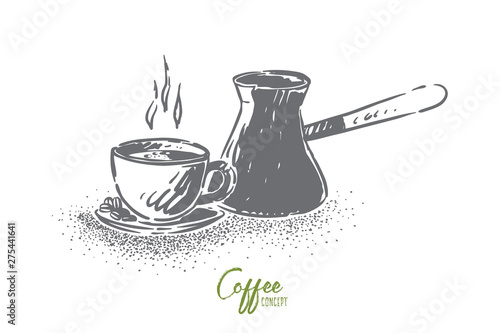 Natural arabic coffee preparation equipment, cup with hot beverage and cezve, copper pot with long handle