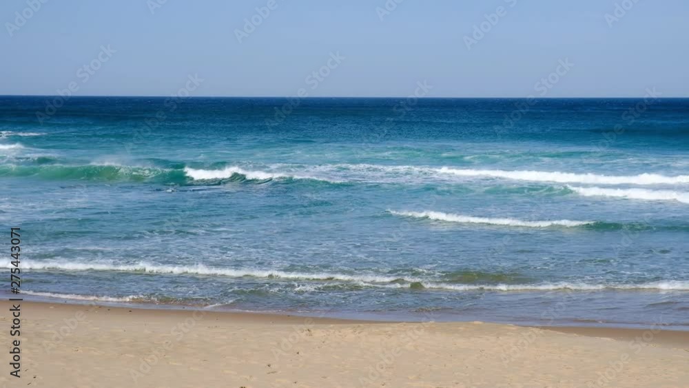 Tropical beach aerial view, Top view of waves break on tropical white sand beach. Sea waves seamless loop on the beautiful sand beach. Tropical beach aerial view, Top view of waves break on tropical white sand beach. Sea waves seamless loop on the beautiful sand beach.