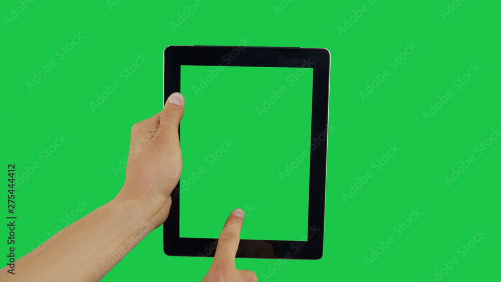 Pointing Finger Clicking On Bottom Center Device Screen with Green Background. Digital Tablet Green Screen. Use in any project that depicts finger, gesture, touchscreen and the like. Pointing Finger Clicking On Bottom Center Device Screen with Green Background. Digital Tablet Green Screen. Use in any project that depicts finger, gesture, touchscreen and the like.