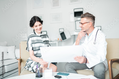 Beautiful woman feeling good after informative consultation photo