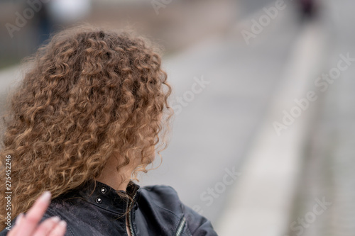 Young woman with curly hair © gallofilm