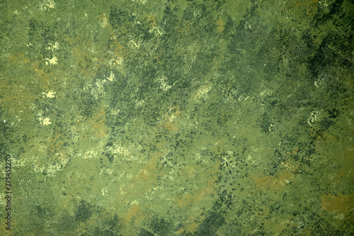 Green bright vintage background, abstract textured wall