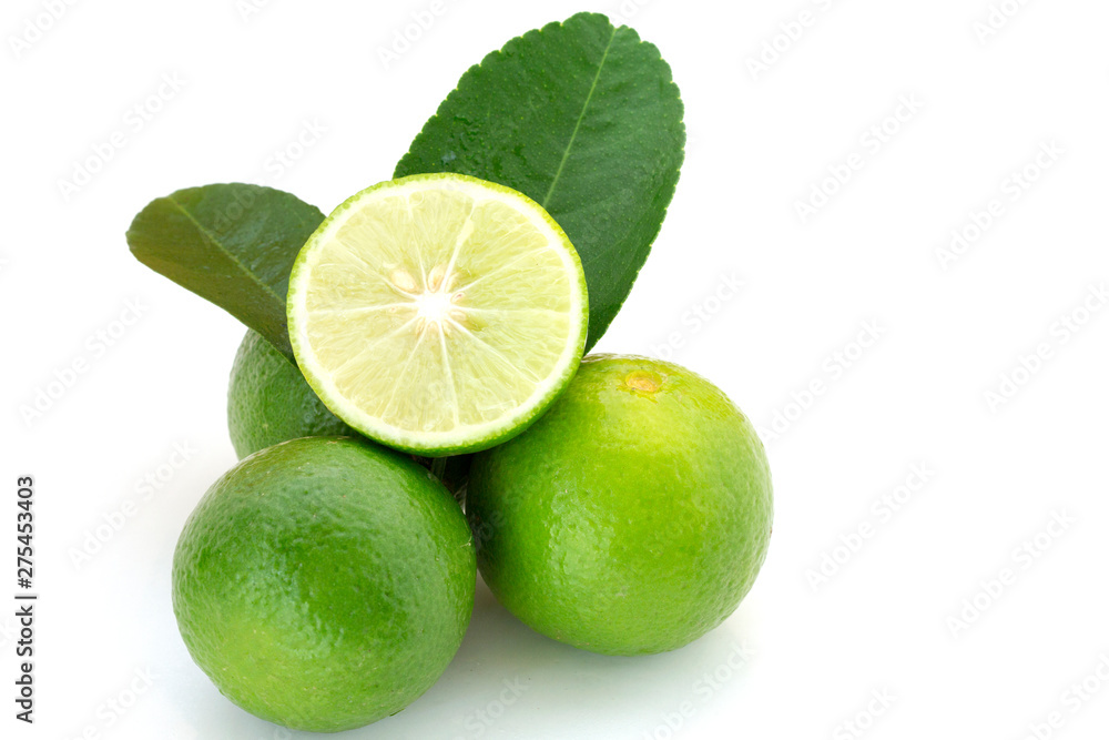 fresh green lime with whole and half with slice isolated on white background fresh green lime with whole and half with slice isolated on white background