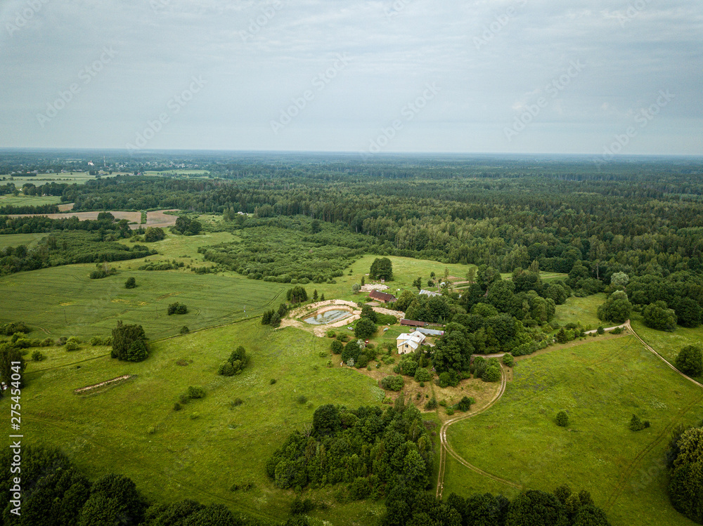 cultivated agriculture fields from above birds eye in summer