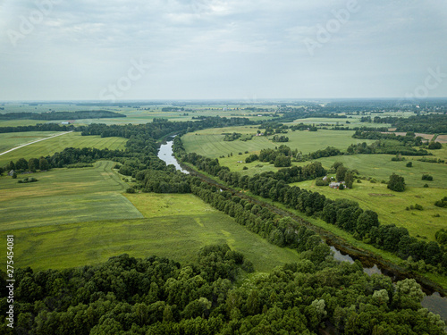 country river in green forest. drone aerial image