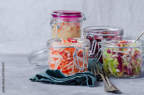 Traditional fermented foods -  sauerkraut, kimchi with carrot, beet, brassica rapa  for  health  and disease prevention.  photo