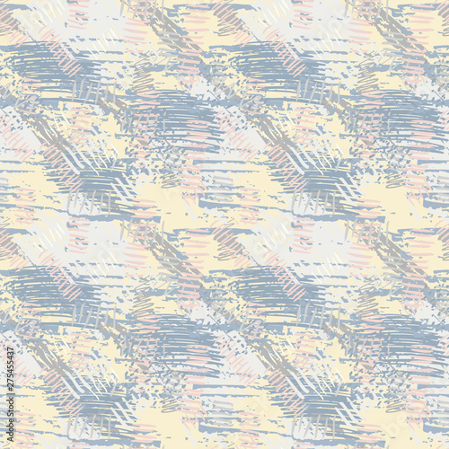 Pastel blue, pink, yellow grunge seamless pattern with abstract hand drawn brush strokes and paint splashes. Messy infinity texture, modern grungy background. Vector illustration. 