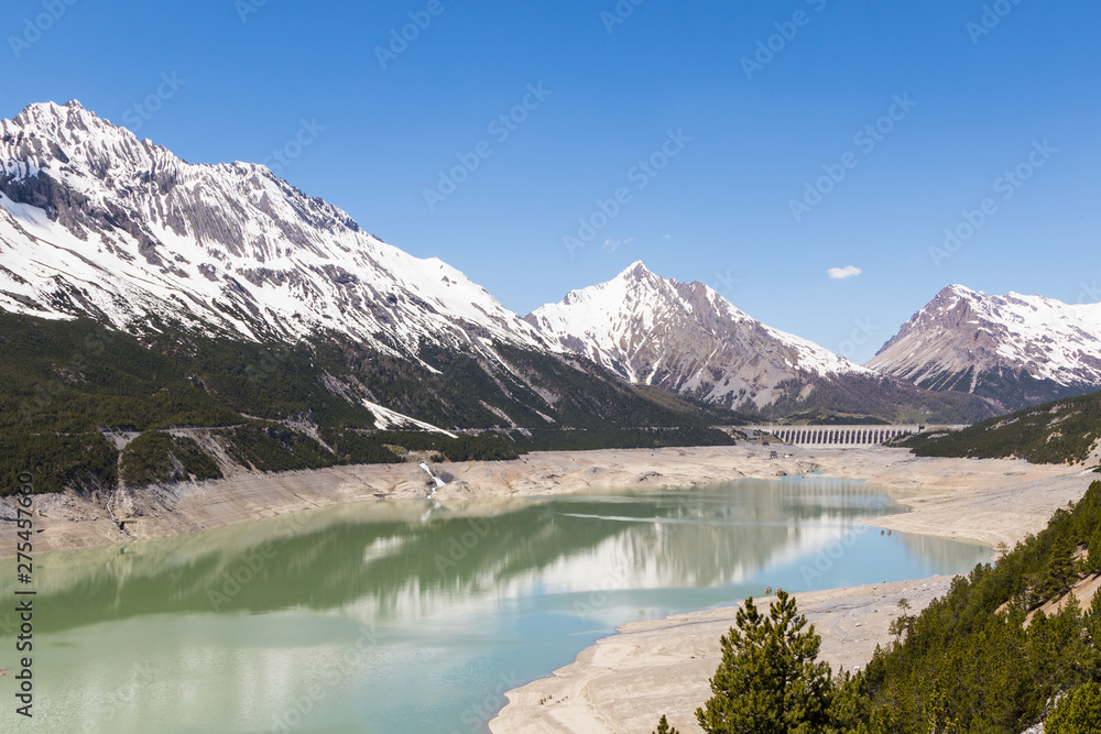 Alpine landscape with artificial lake, italy