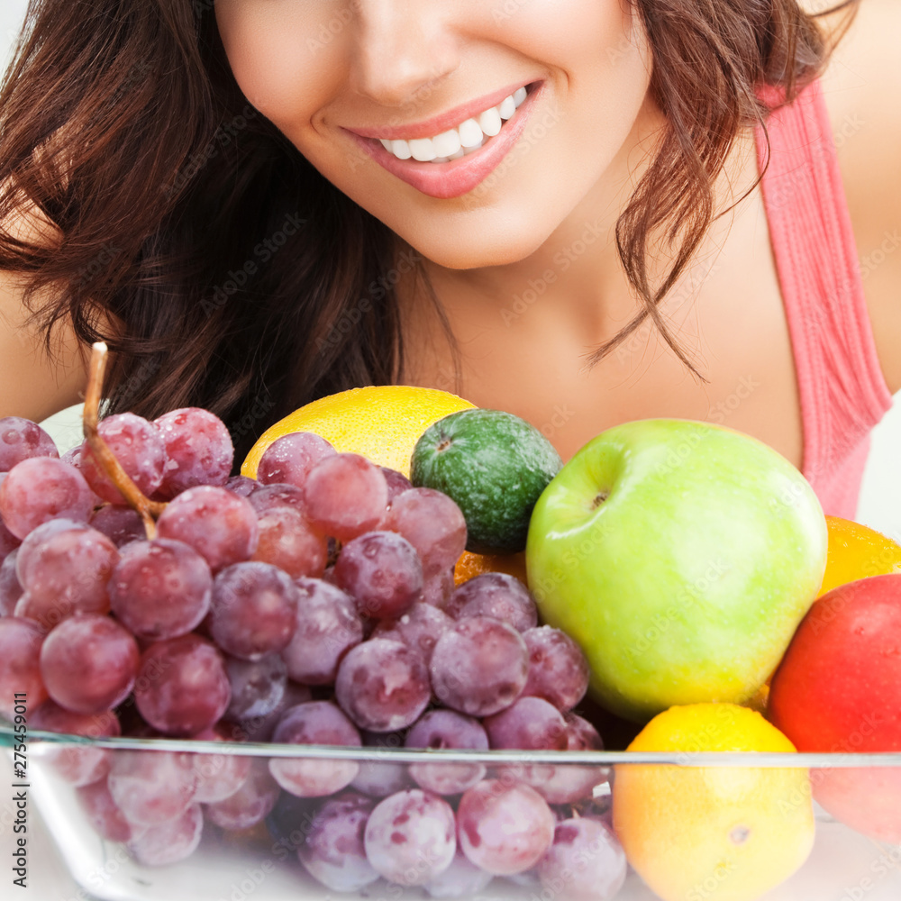 dark haired girl with plate of fruits, outdoors dark haired girl with plate of fruits, outdoors
