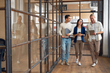 Multiracial young creative people in modern office. Group of young business people hipster team are working together in coworking . Freelancers