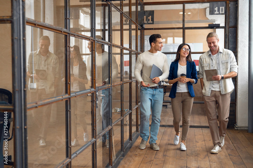Multiracial young creative people in modern office. Group of young business people hipster team are working together in coworking . Freelancers