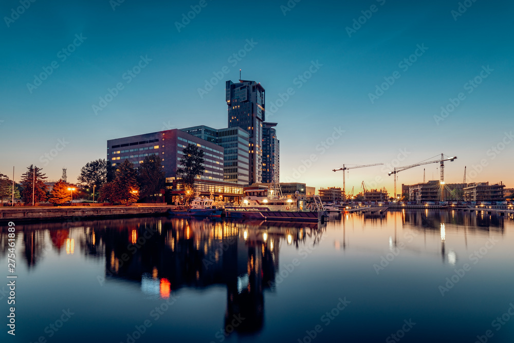 Sea Towers skyscraper in Gdynia after sunset